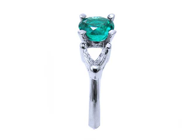 Round cut Colombian emerald rings