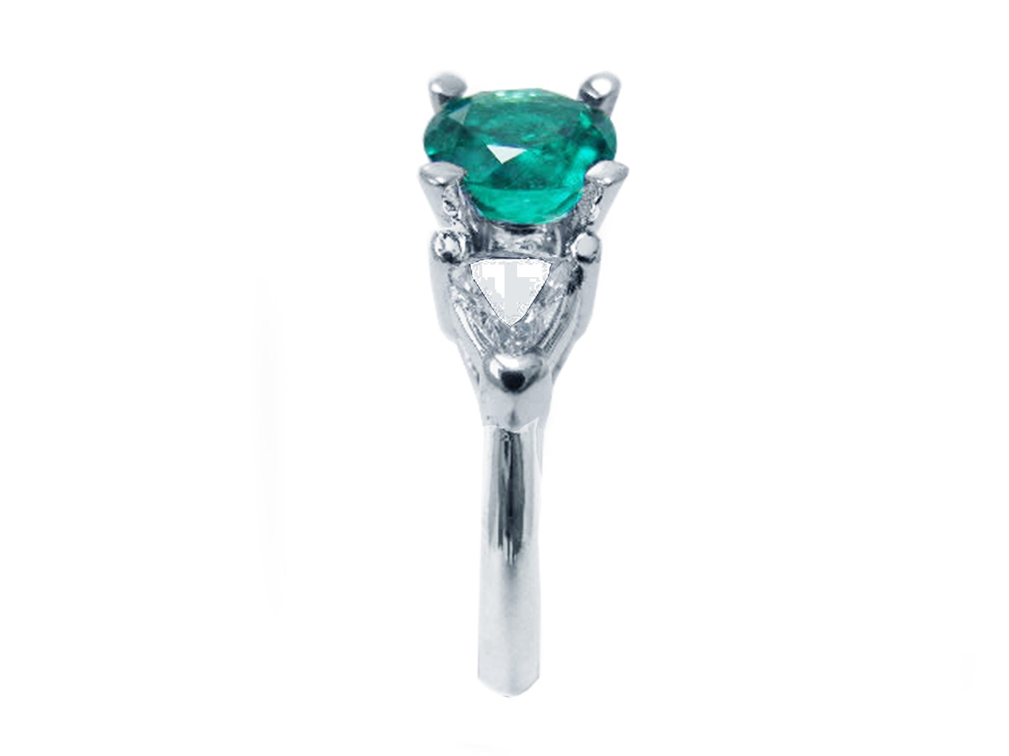 Emerald and side trillion cut diamonds ring