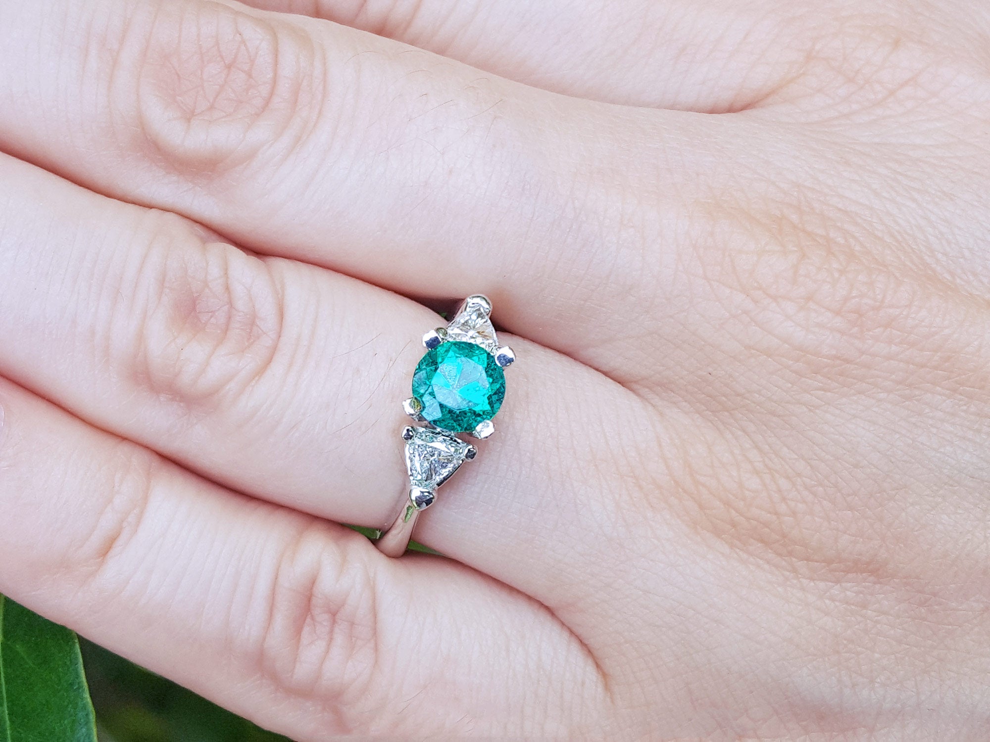 Round cut and trillion side diamond ring for women