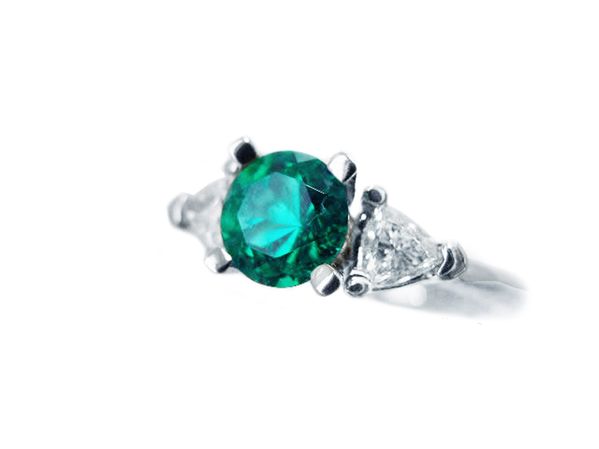 Round cut Colombian emerald ring