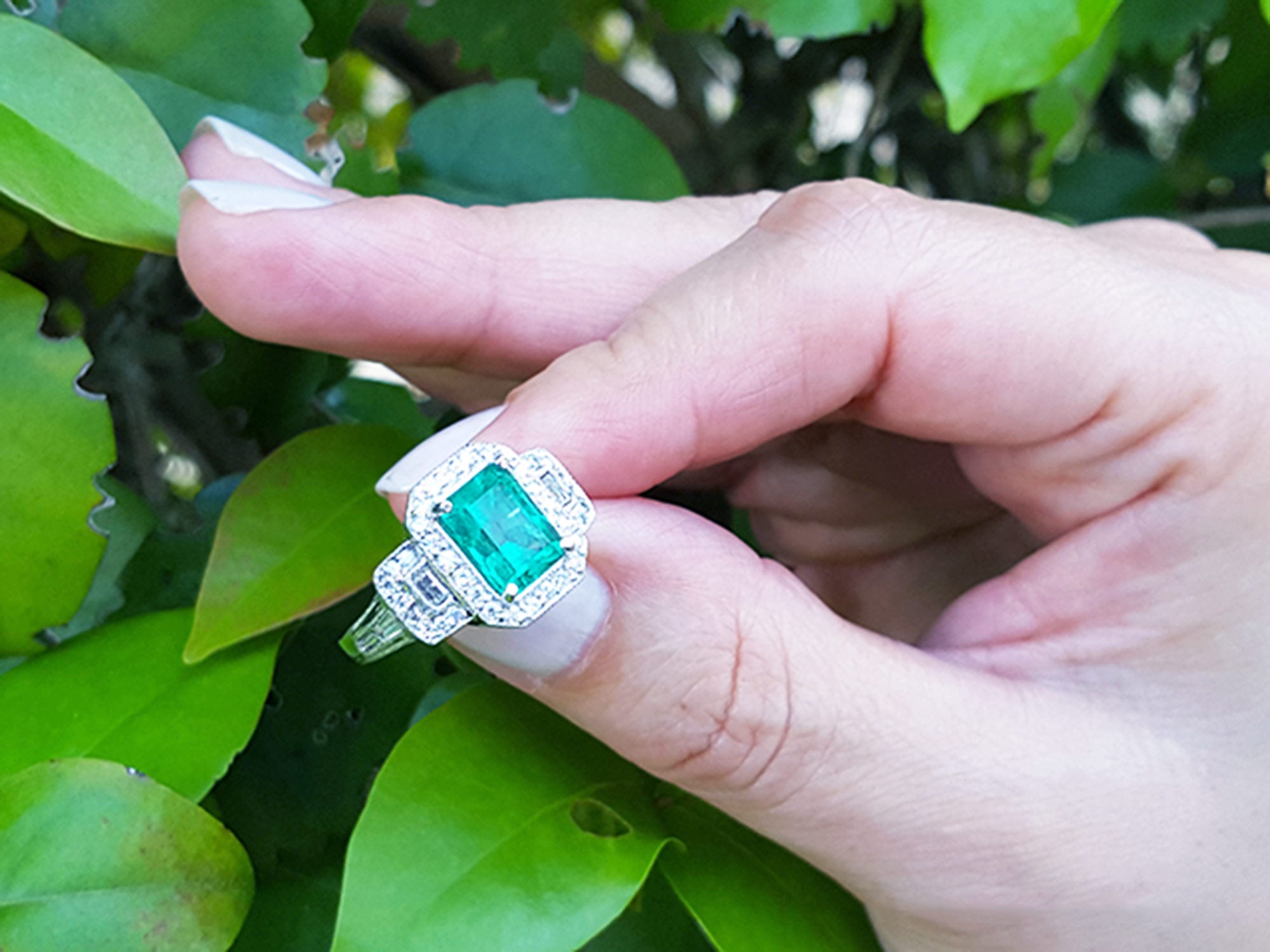 18k white gold emerald engagement ring
