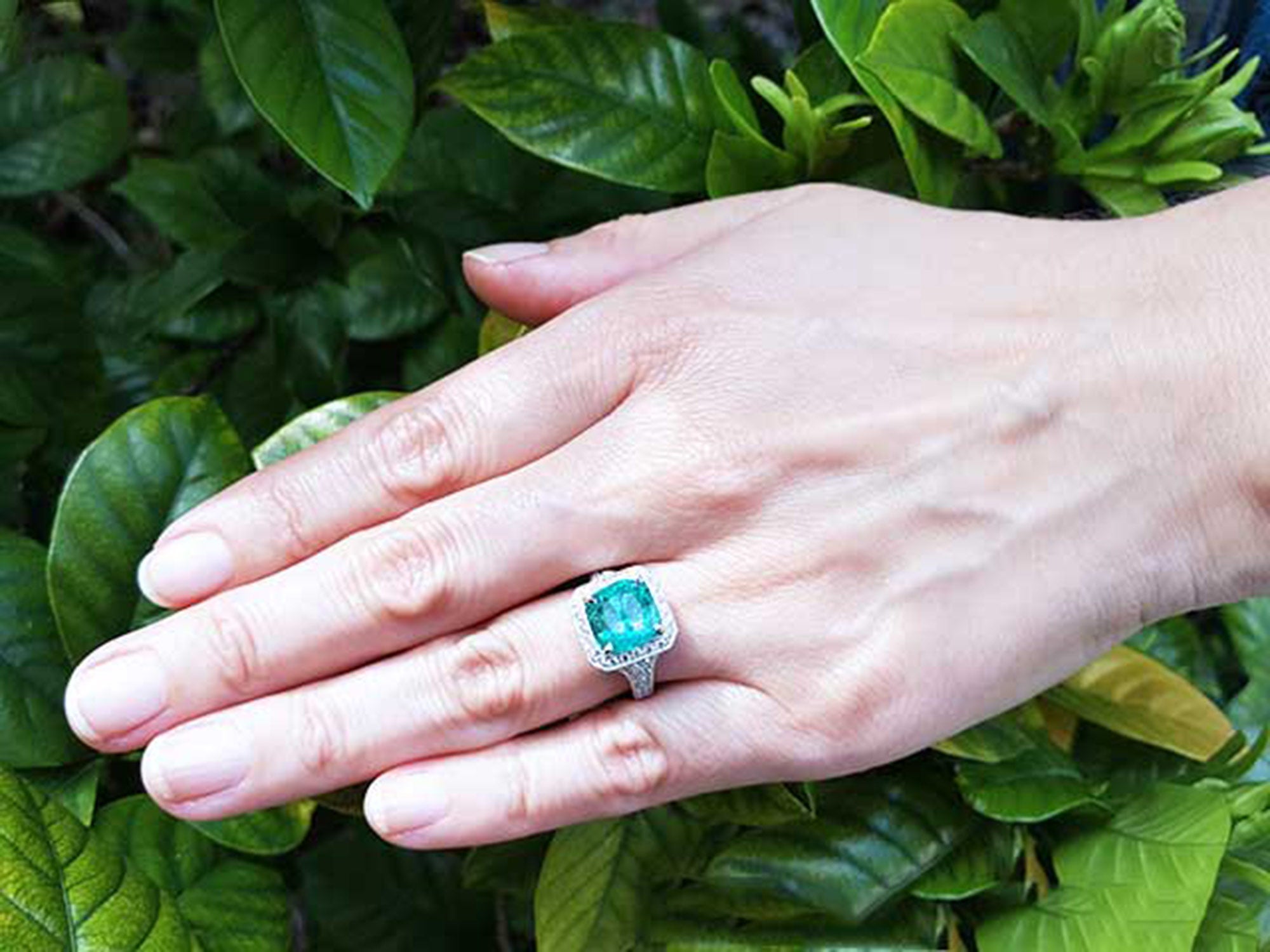 Ladies emerald cushion cut ring