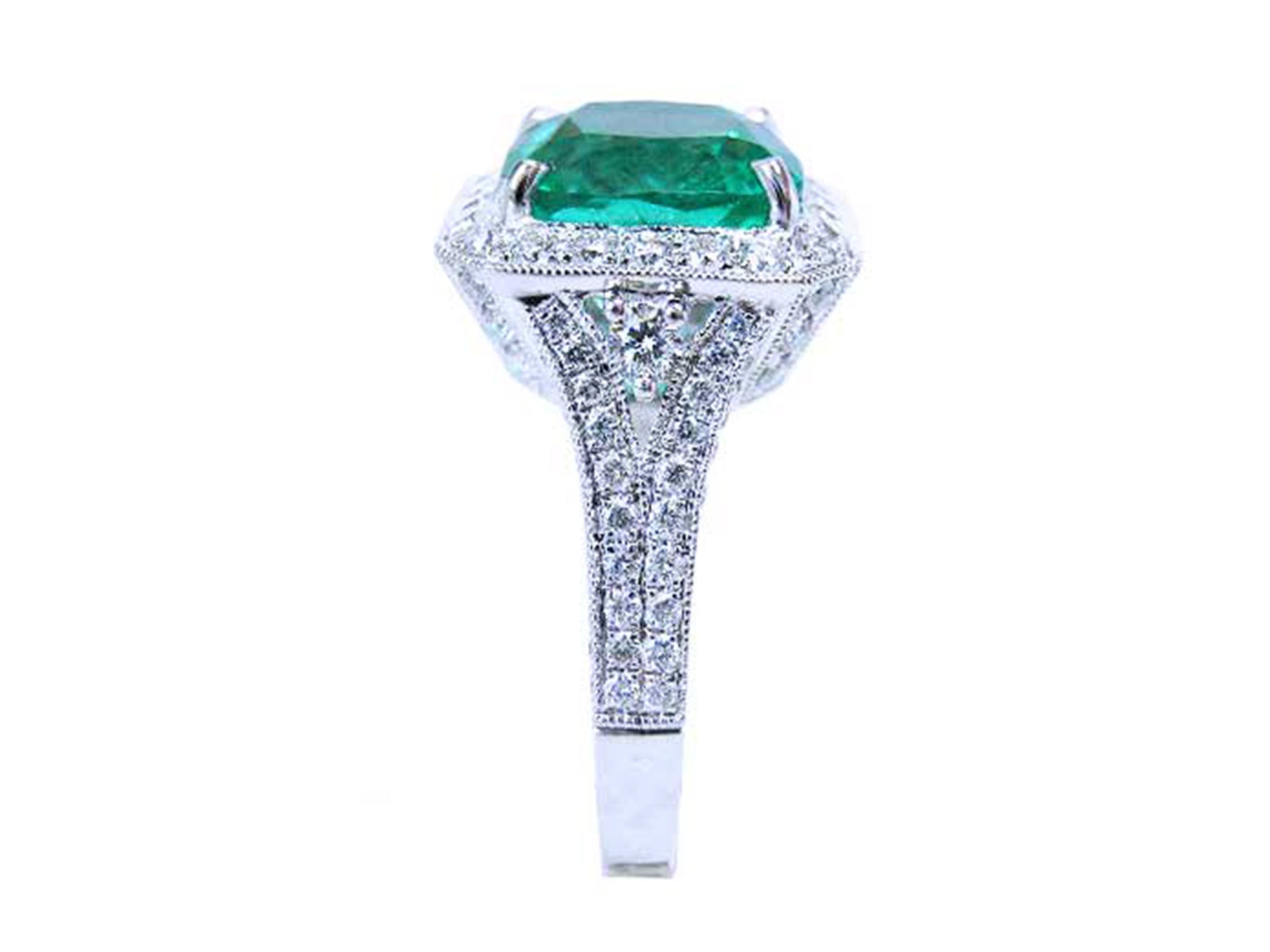 Emerald and diamond engagement ring