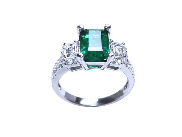 Deep green Colombian emeralds rings