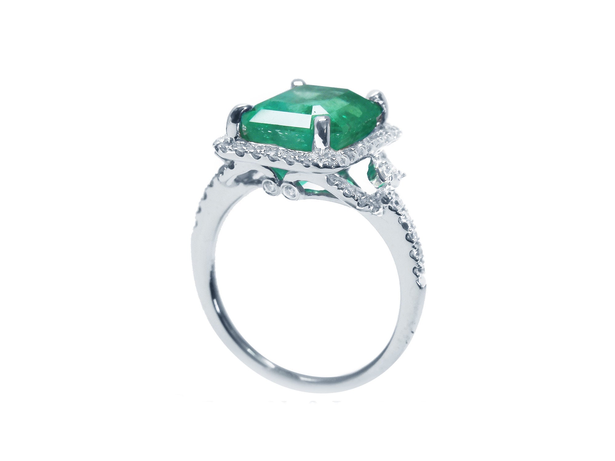 Emerald and diamond engagement ring