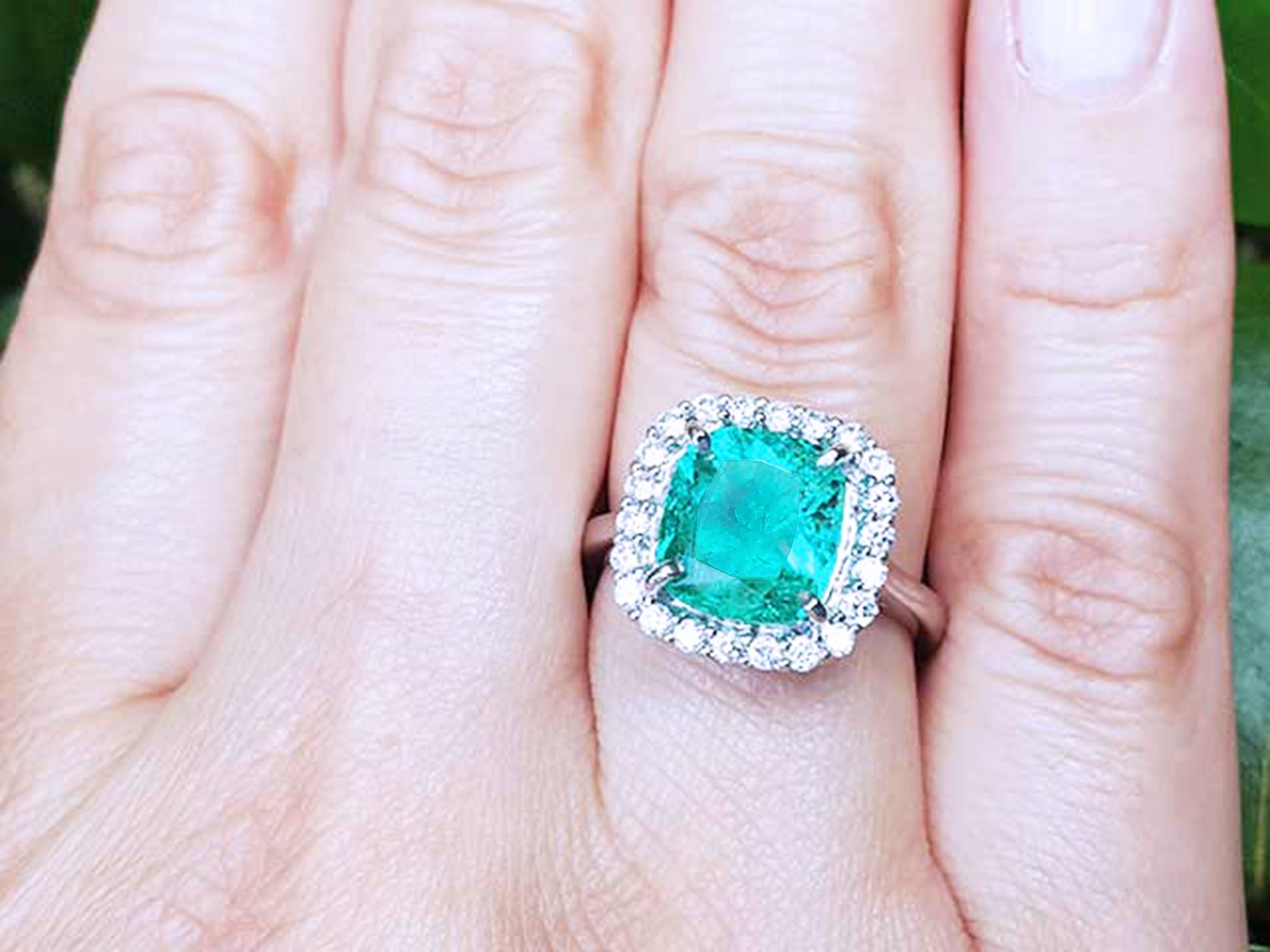 Ladies emerald ring cushion cut