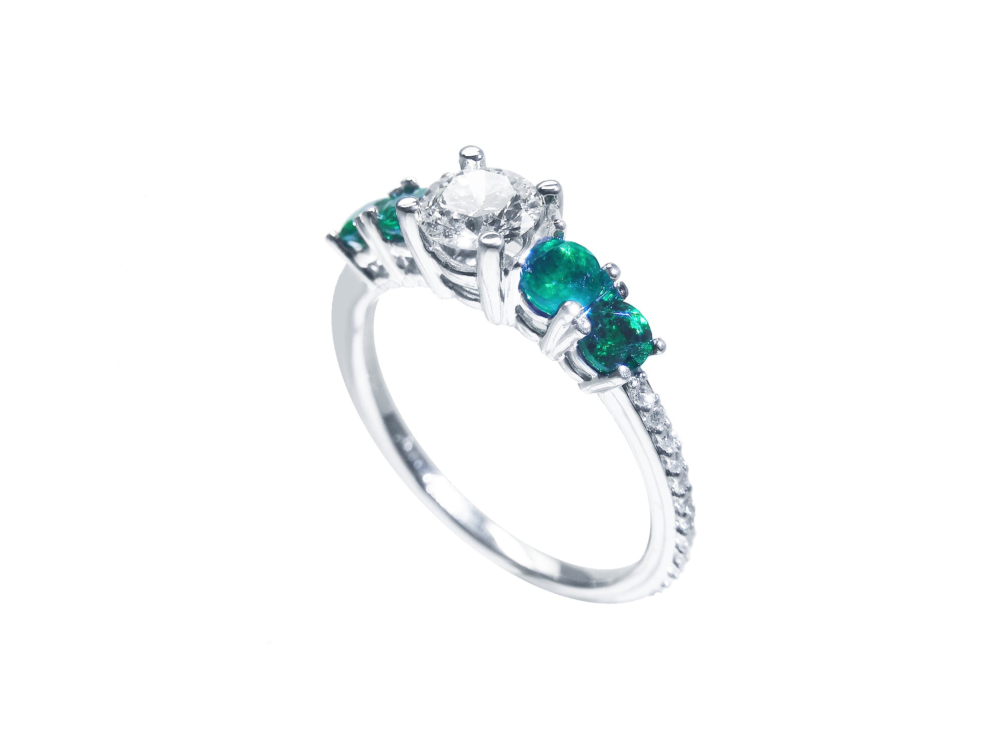 Five stone emerald and diamond ring