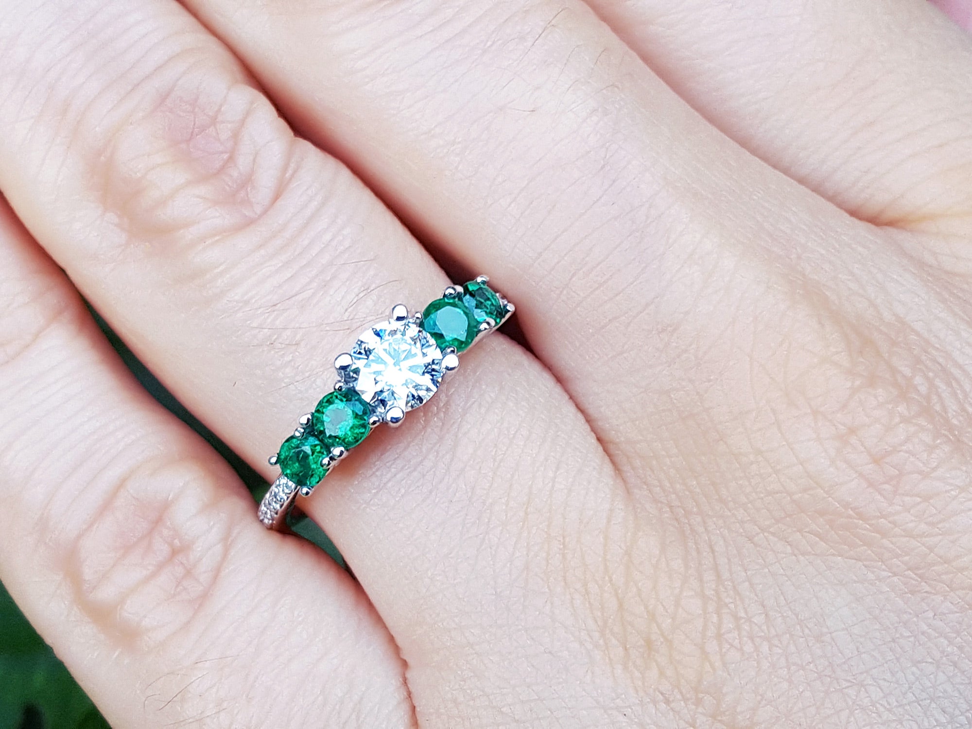 Brides&#39; May birthstone emerald and diamond ring