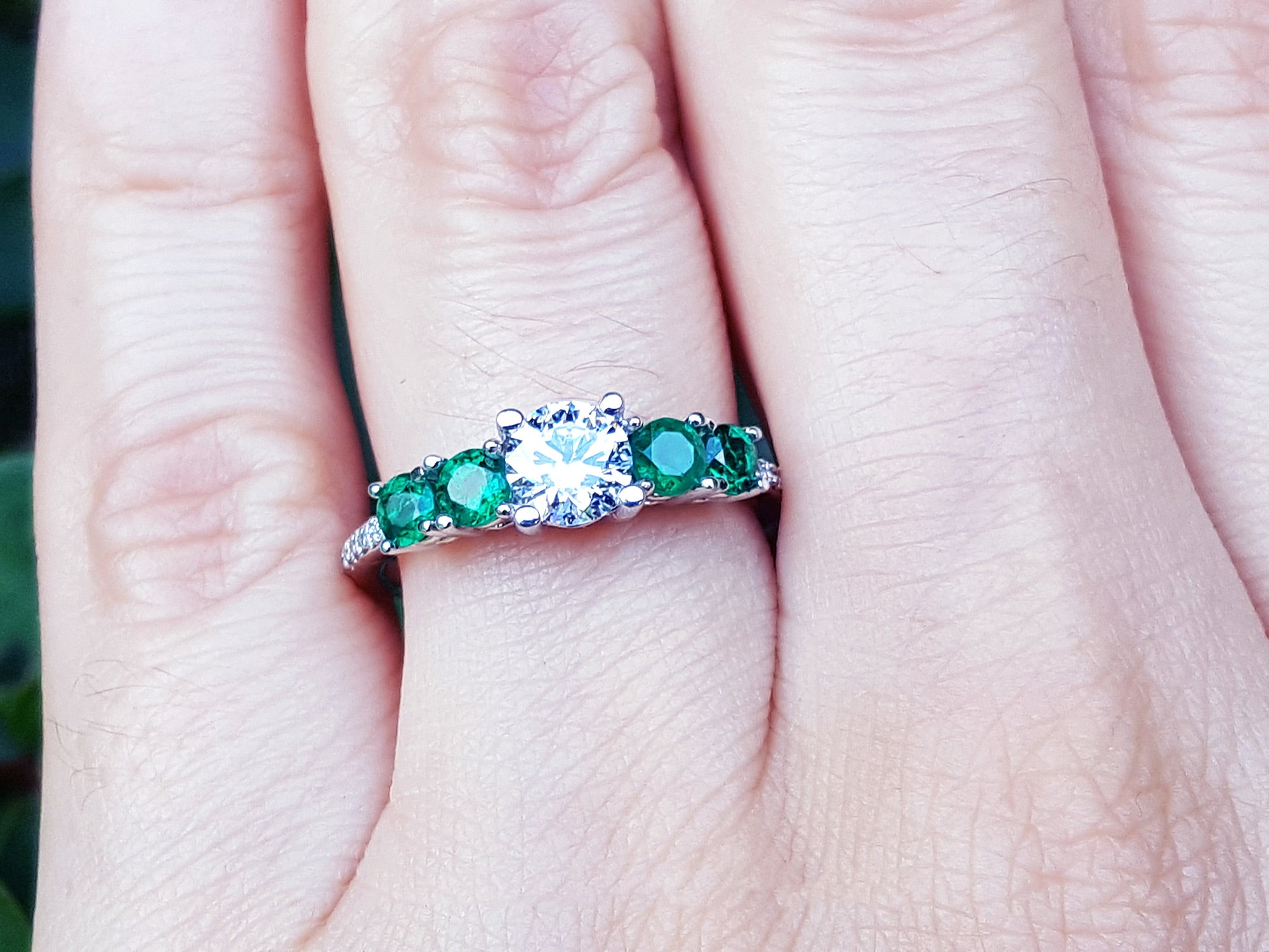 Diamond and emeralds engagement ring