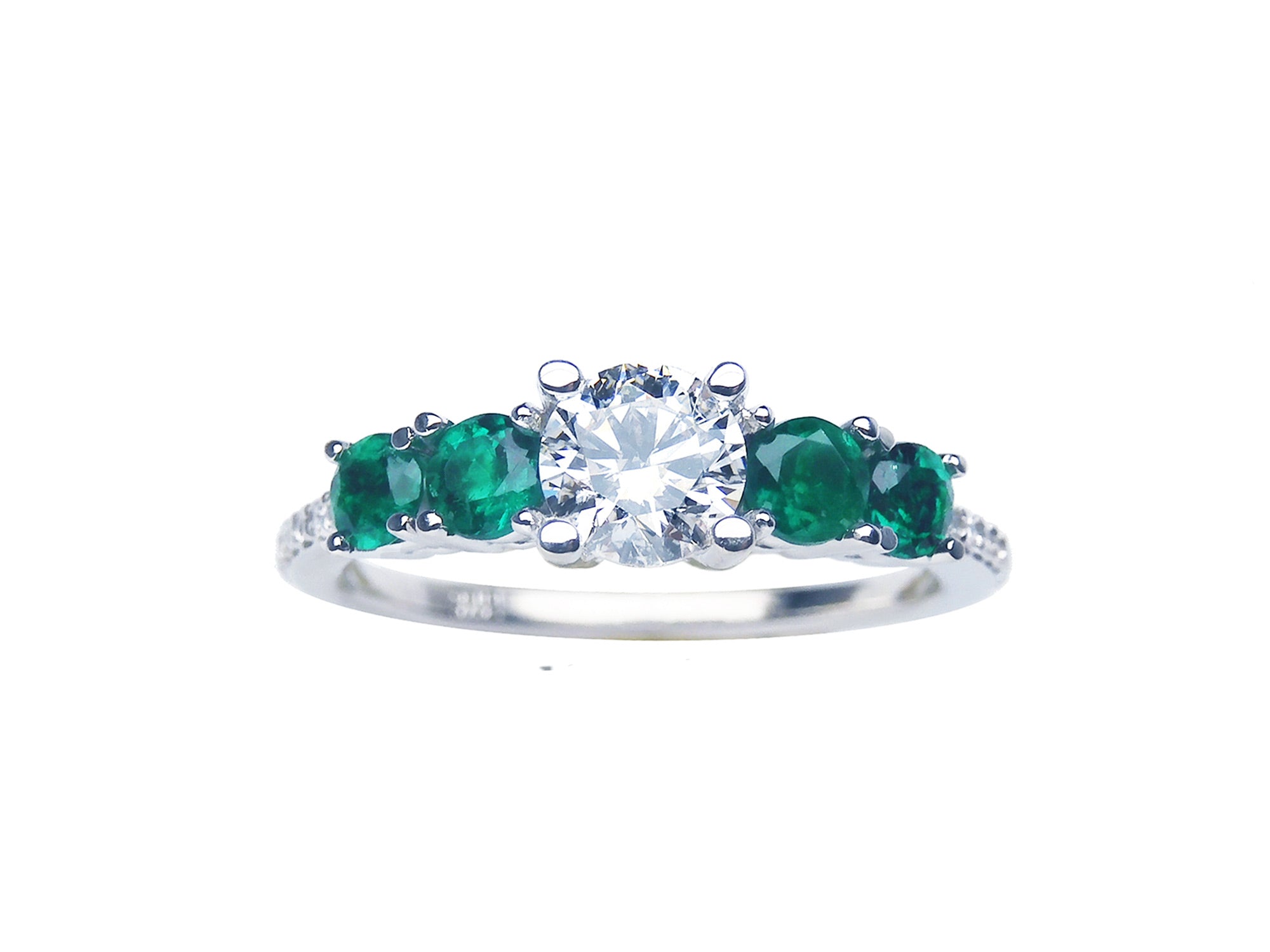 Round cut diamond and side emeralds ring for women