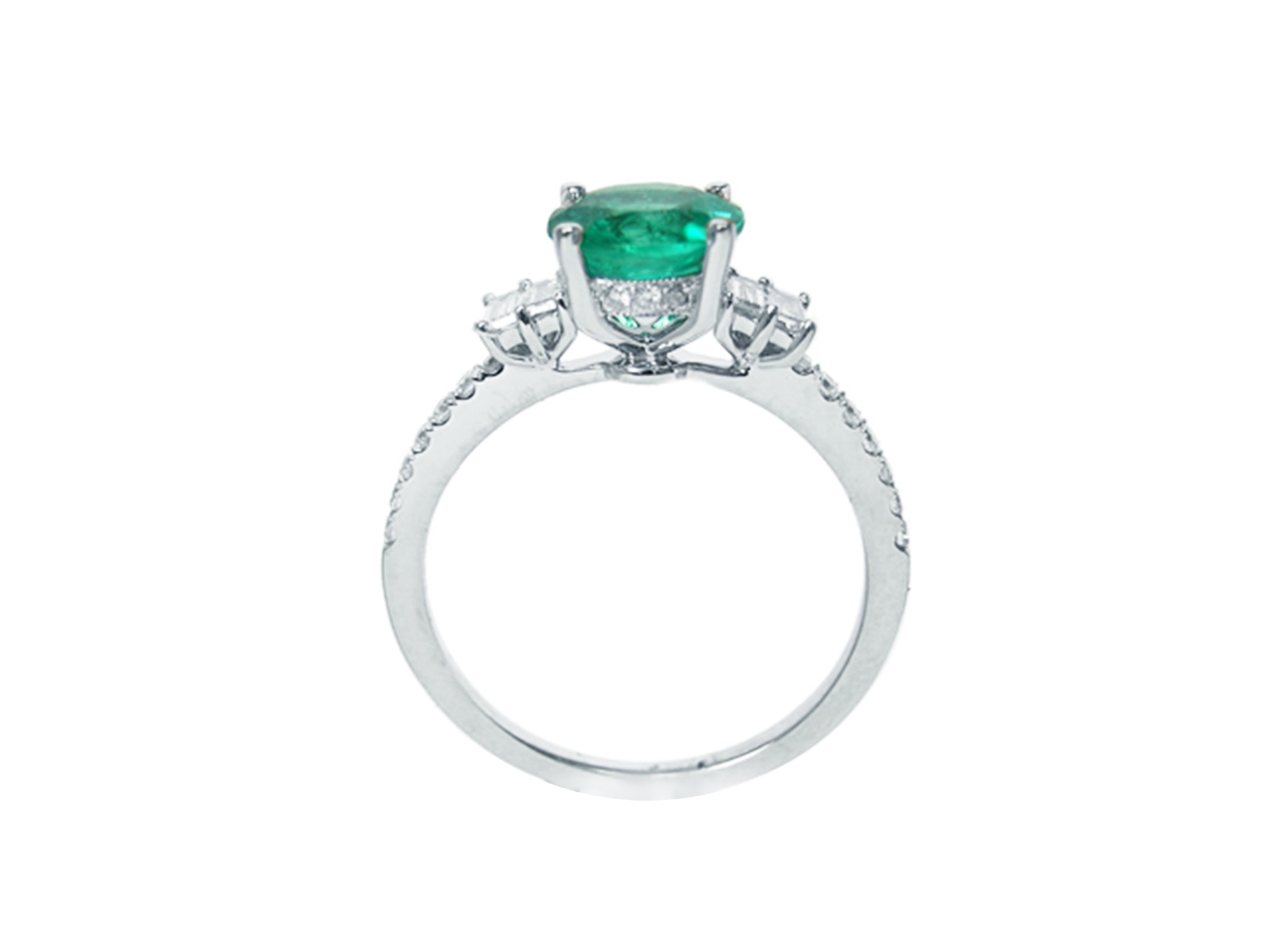 White gold emerald engagement ring