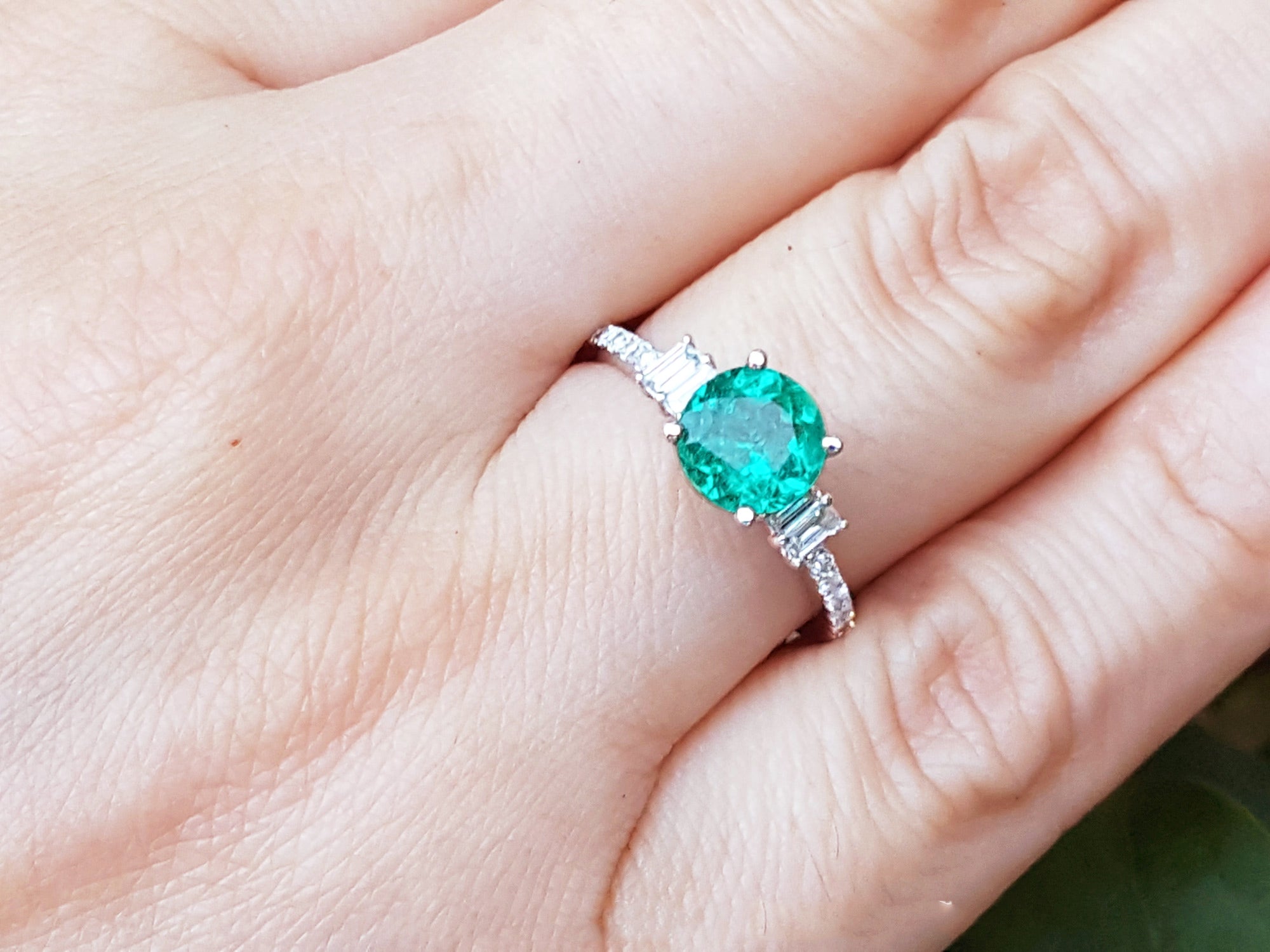 Affordable engagement ring with Colombian emerald