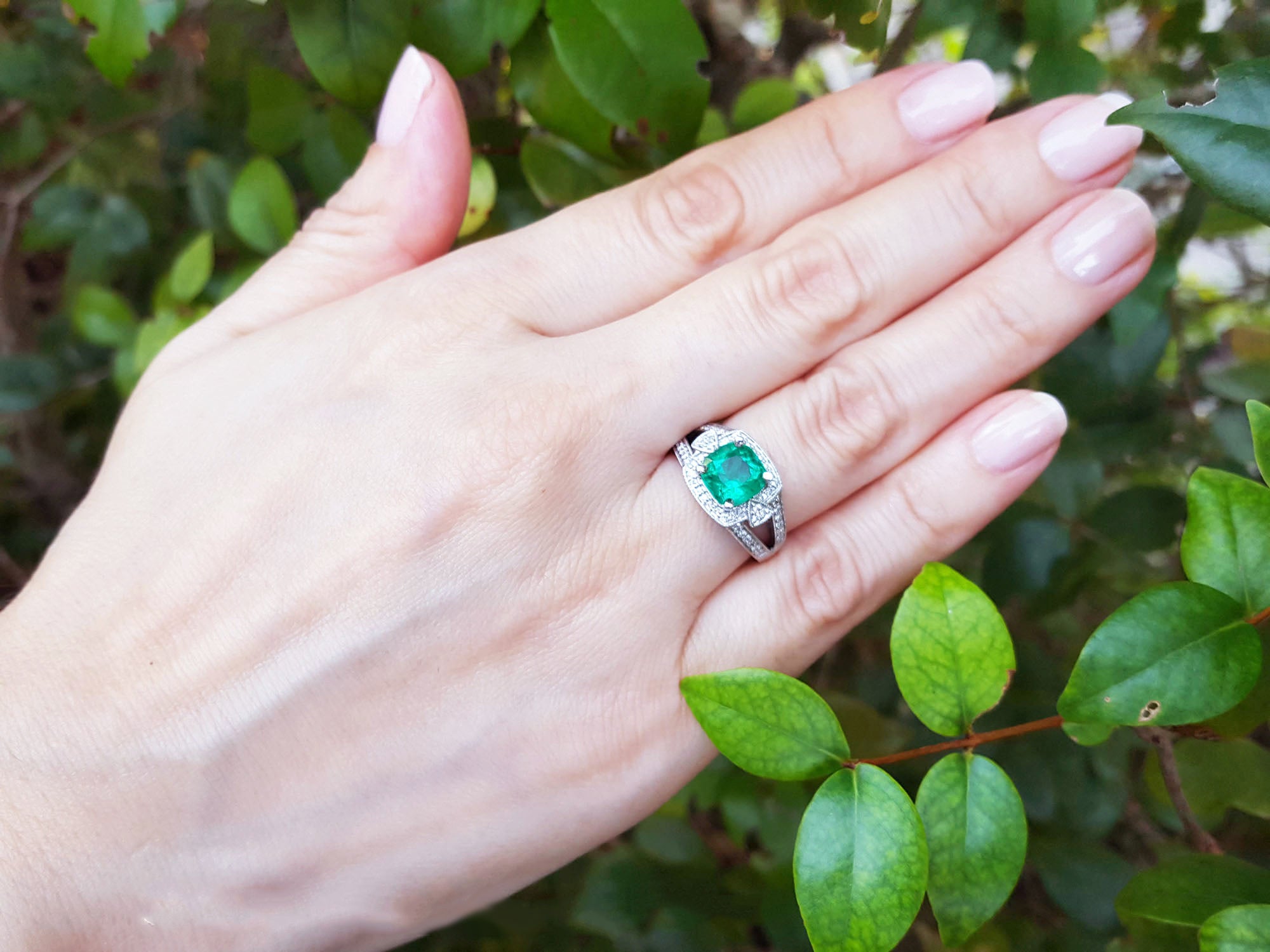 Ladies emerald and diamond ring