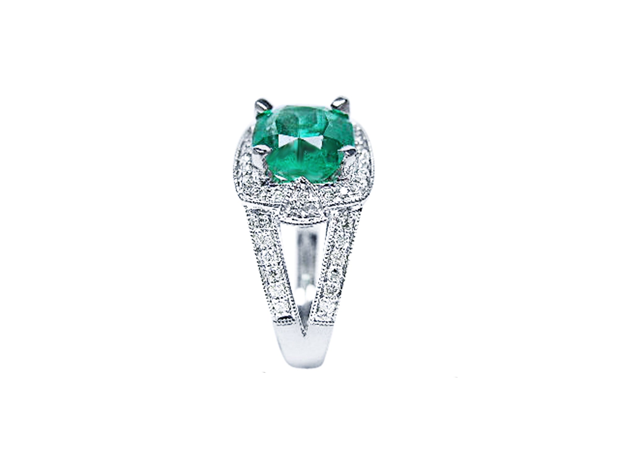 White gold cushion cut emerald ring