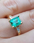 Emerald and baguette diamonds engagement rings