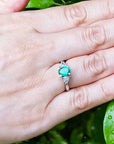 Three stone emerald engagement rings