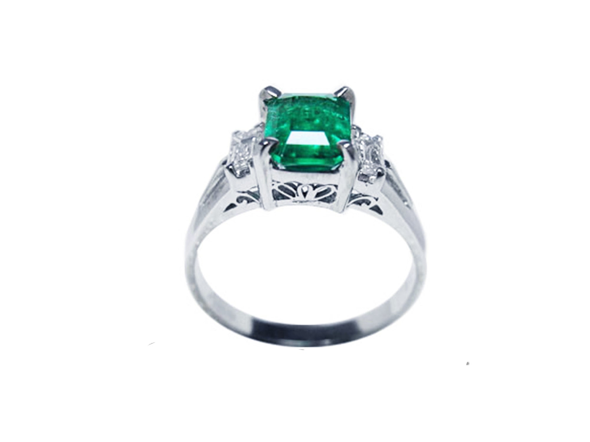 Emeral and side baguette diamond ring