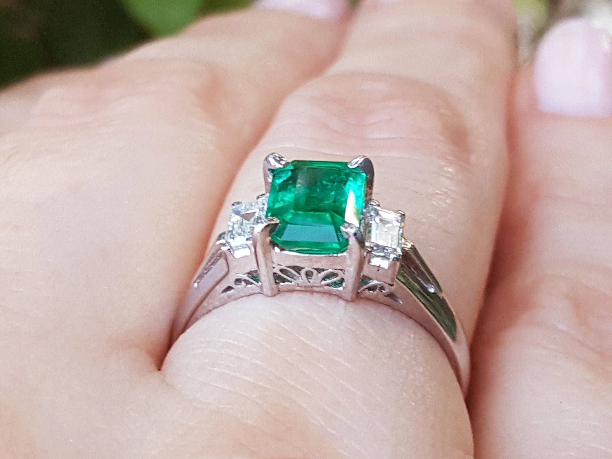 Emerald-cut emerald platinum ring