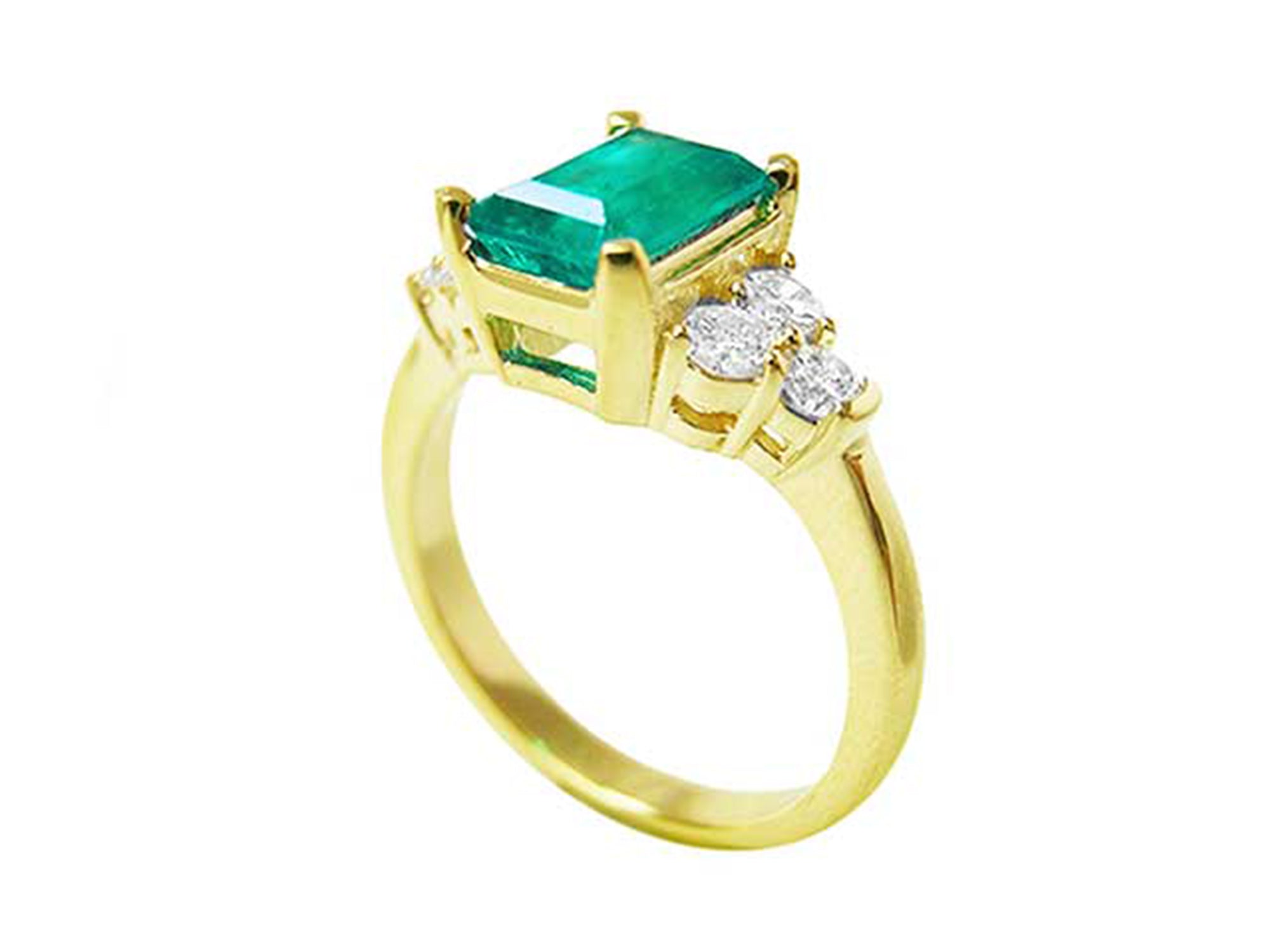 Emerald and accent side diamond rings