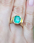 Emerald-cut solitaire emerald rings