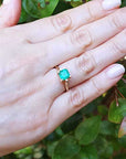Emerald solitaire ring yellow gold