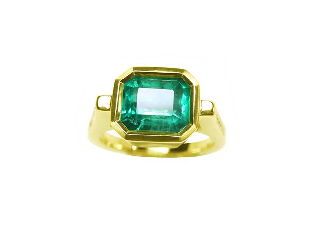 Hand made solid gold emerald ring
