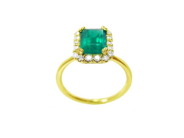 Halo emerald-cut Colombian emerald ring