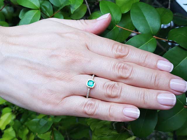 Bezel set Colombian emerald ring