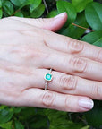 Bezel set Colombian emerald ring