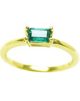 Emerald solitaire ring