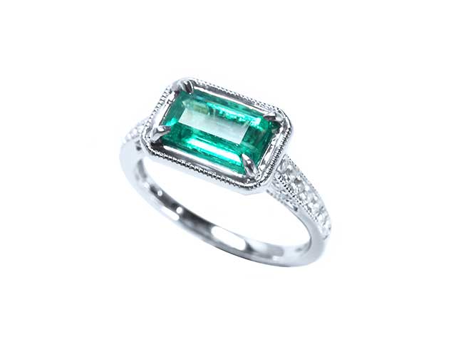 Cheap emerald engagement ring with diamond