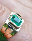 Solid gold ring with emeralds