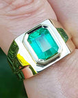 Natural emerald bezel set ring
