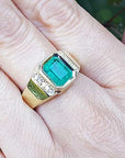 Solid gold ring with emerald