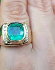 Men’s gold ring with emerald