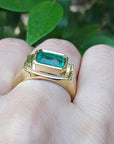 Men’s gold ring with emeralds