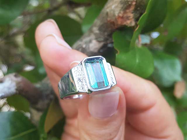 Natural emerald bezel set ring