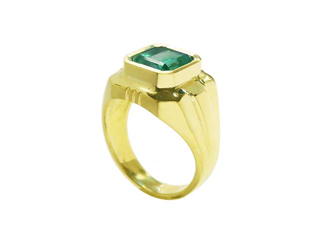 Natural emerald bezel set ring