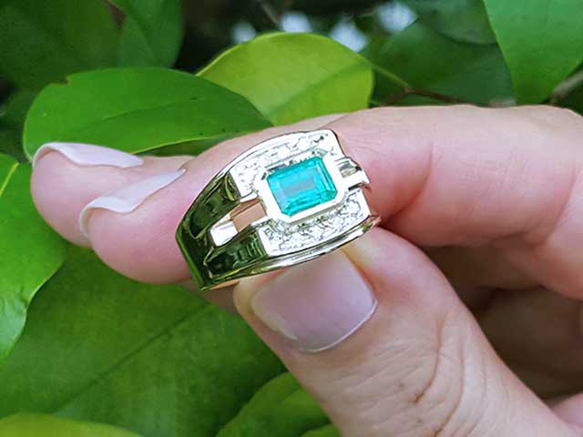 Natural emerald bezel set ring