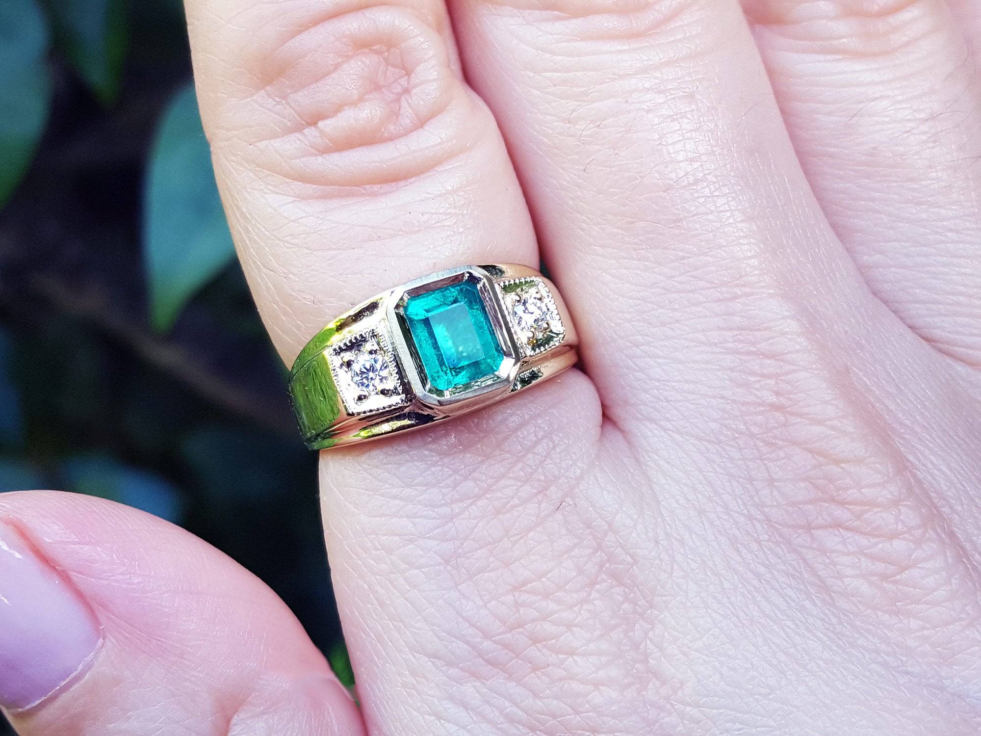 Men’s May birthstone emerald rings