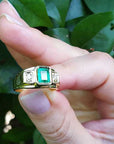 Solid yellow gold ring with emerald