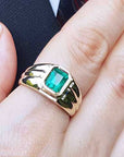 Men’s emerald and gold ring