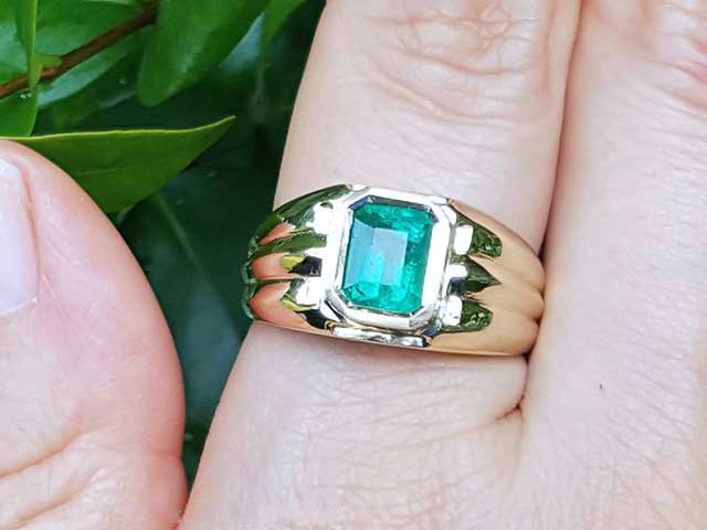 Natural emerald bezel set ring