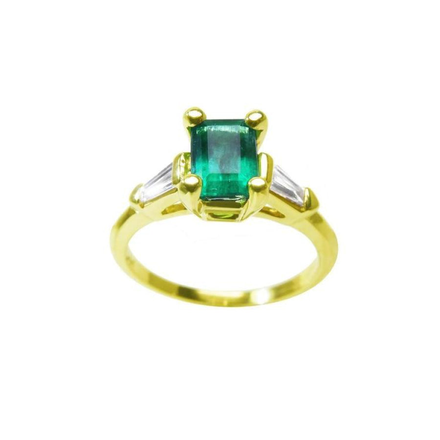 A natural colombian emerald ring with side baguette diamonds, the May's birthstone jewelry.