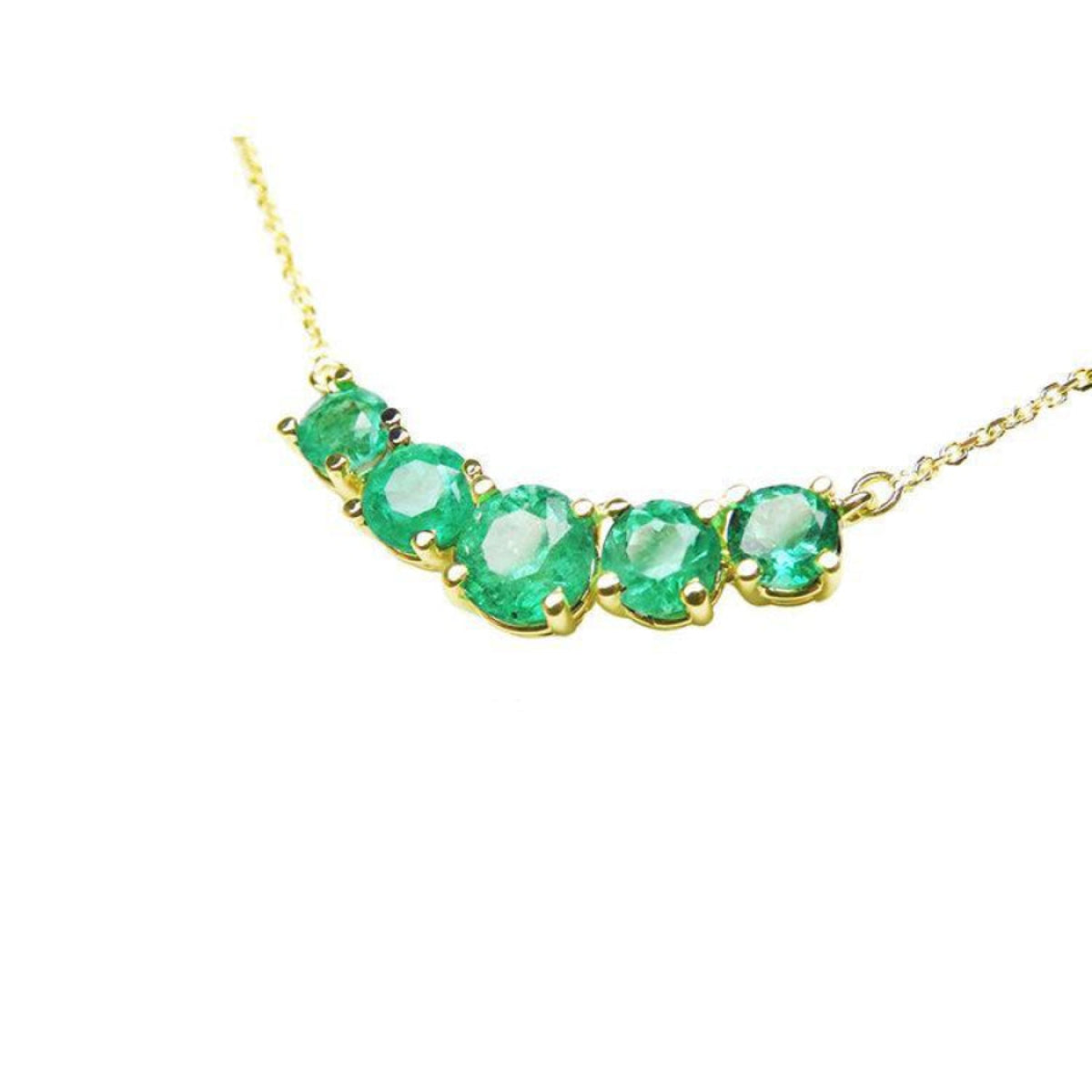 14K gold necklace with five round, medium green Colombian emeralds in basket settings.