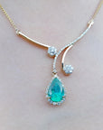 Yellow gold emerald necklace