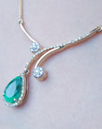 Pear cut necklace and halo diamond