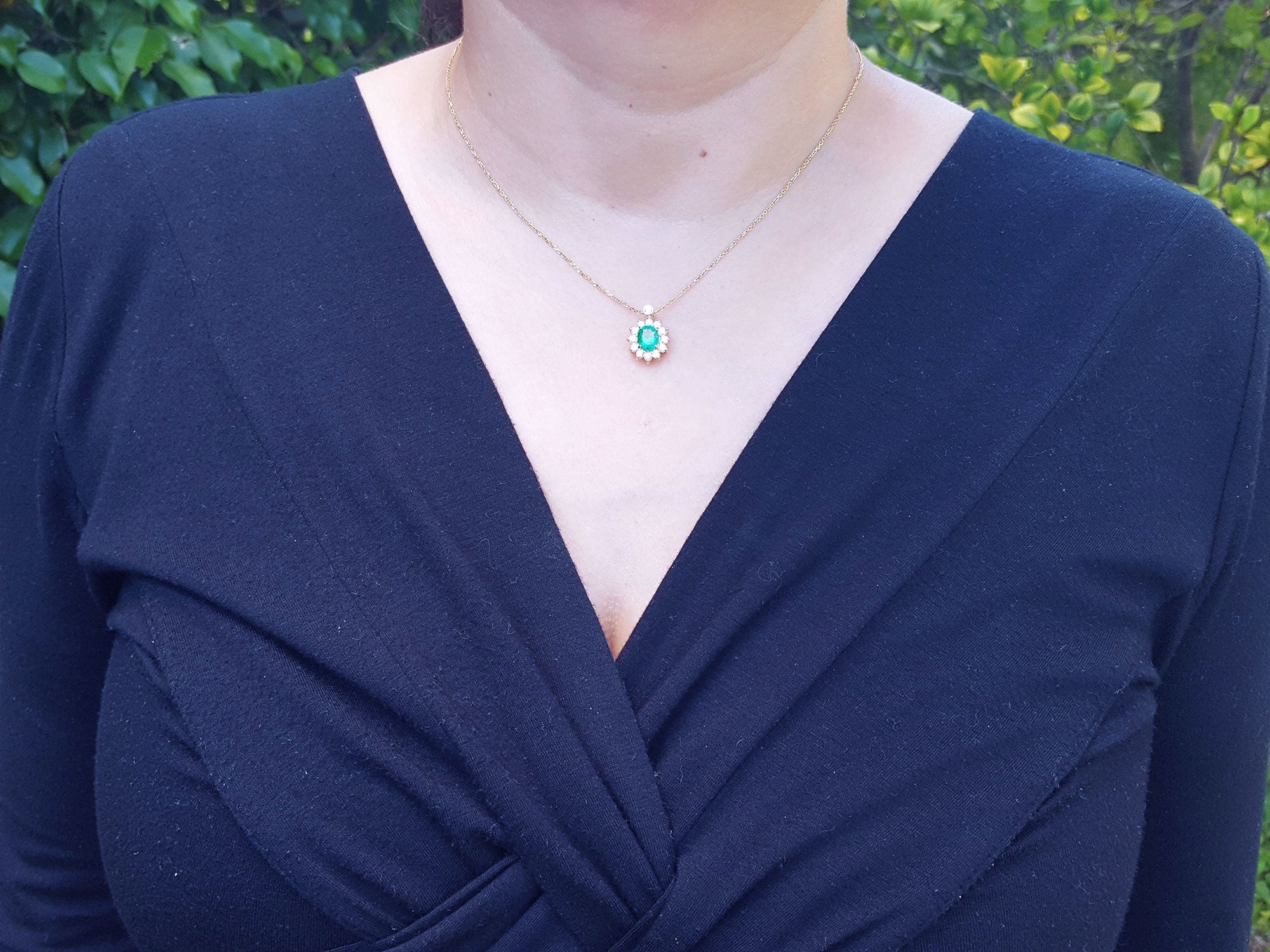 Emerald halo diamond necklaces