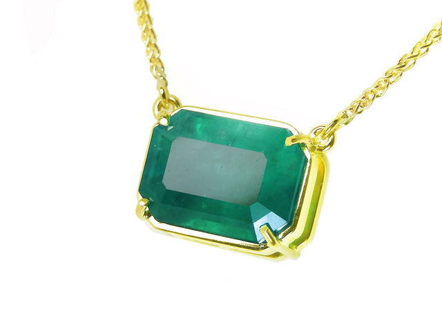 Deep green Colombian emerald solitaire necklace