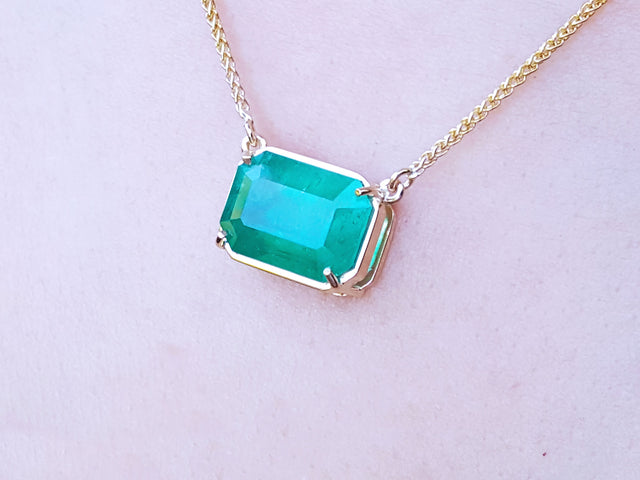 Solid yellow gold emerald solitaire necklace